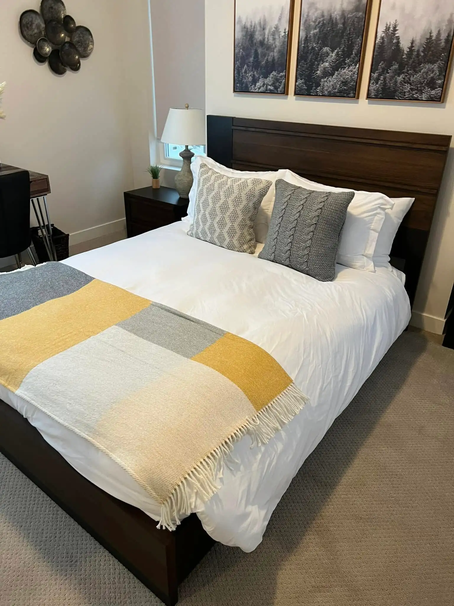 Hotel style staged bed after an Airbnb turnover clean