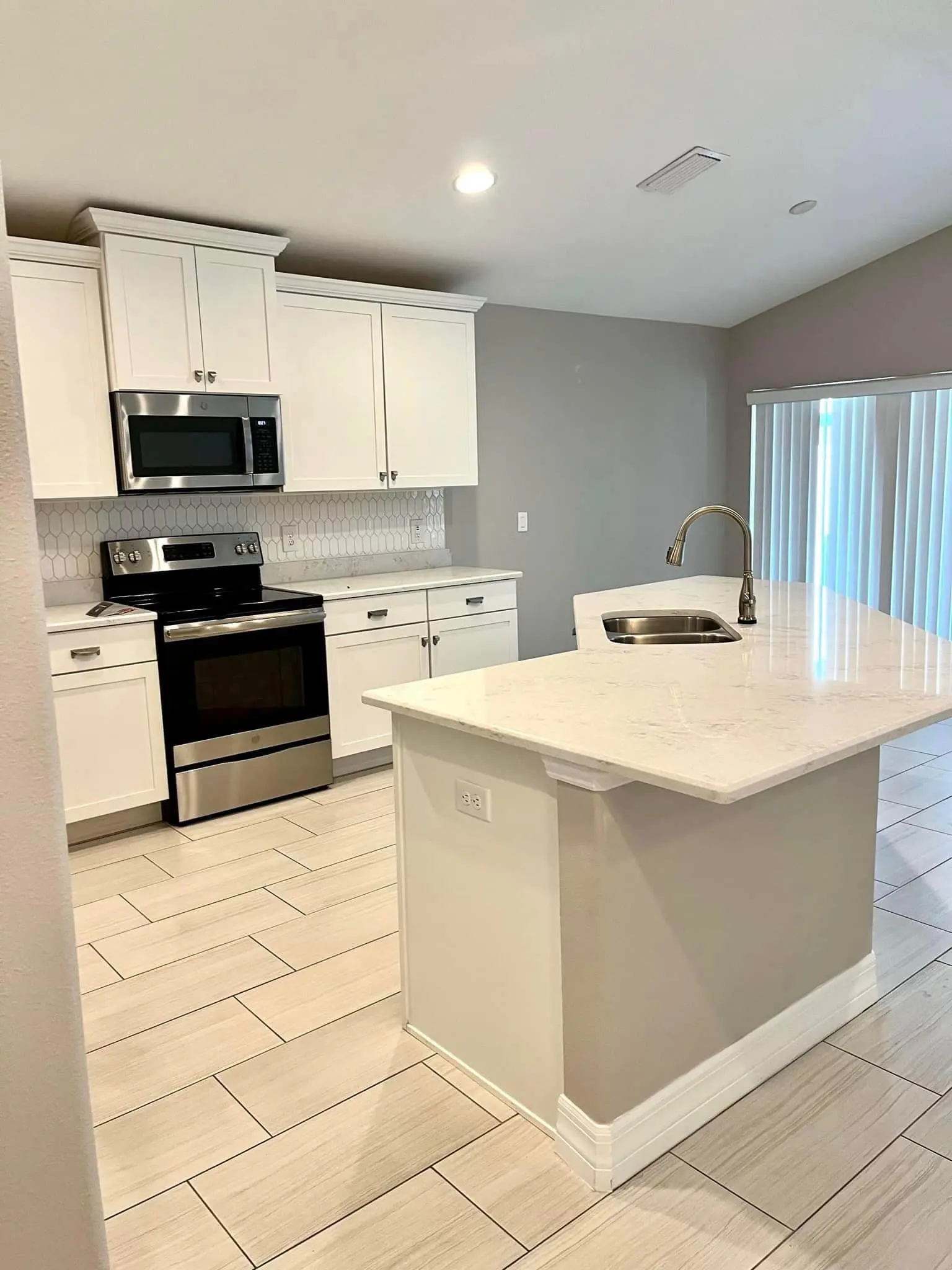 Spotless white kitchen after a recurring clean near Park City